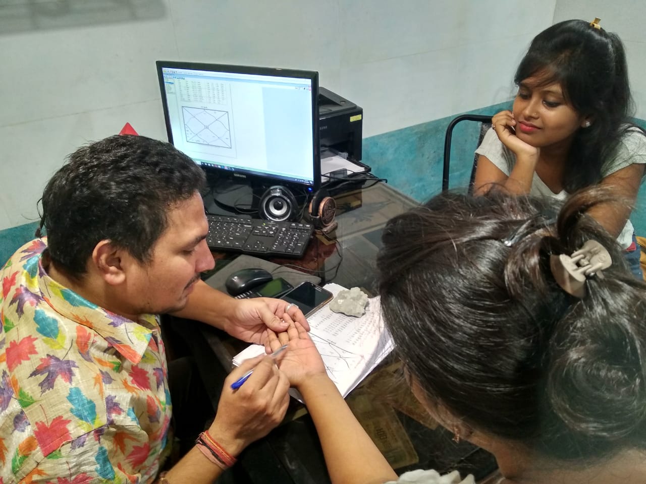 Reviewing a Janma Kundali chart at the clinic
