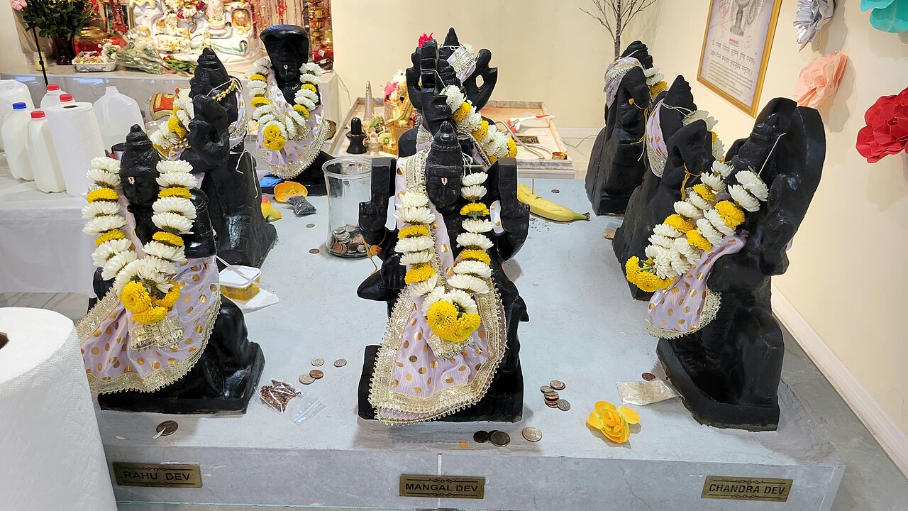 Navagraha idols garlanded for worship